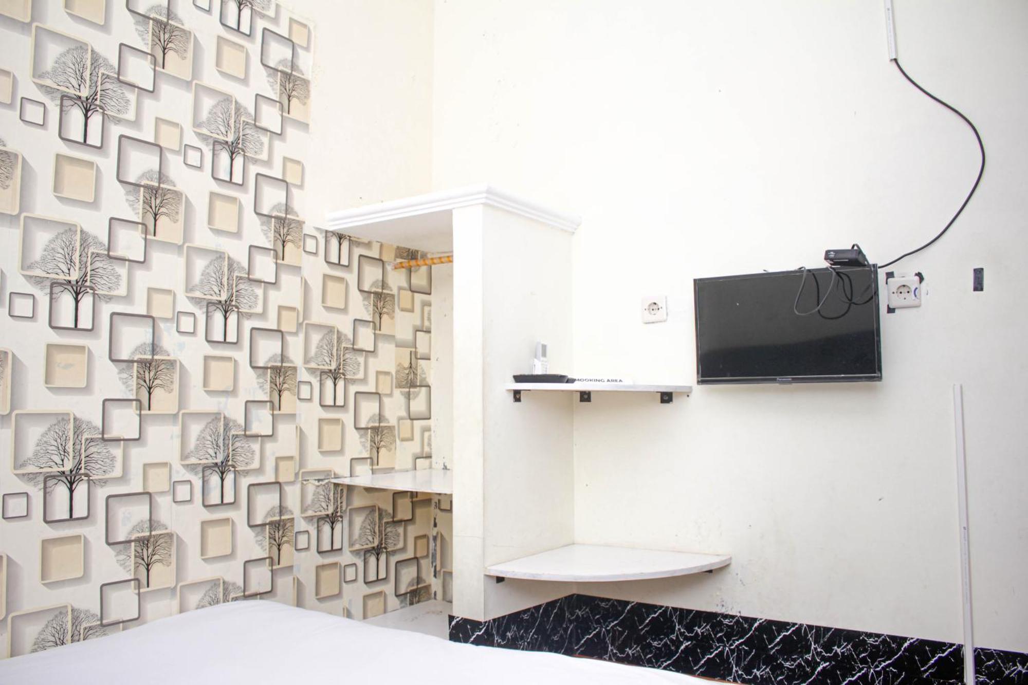 Super Oyo Capital O 2258 Santana Syariah Guest House 카르토수로 외부 사진